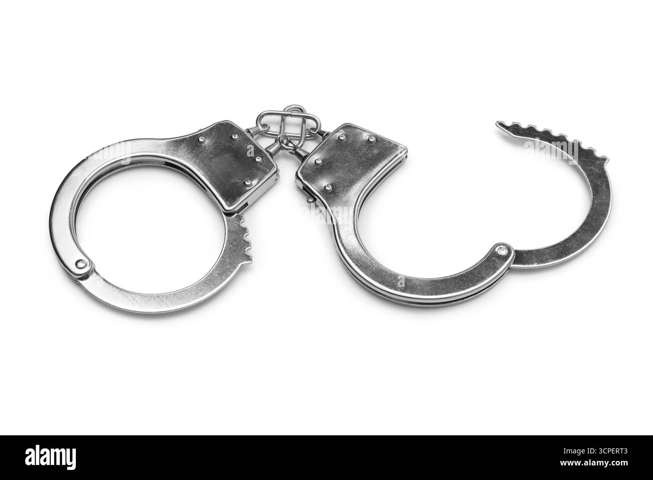 Menottes métalliques sur fond gris Banque D'Images