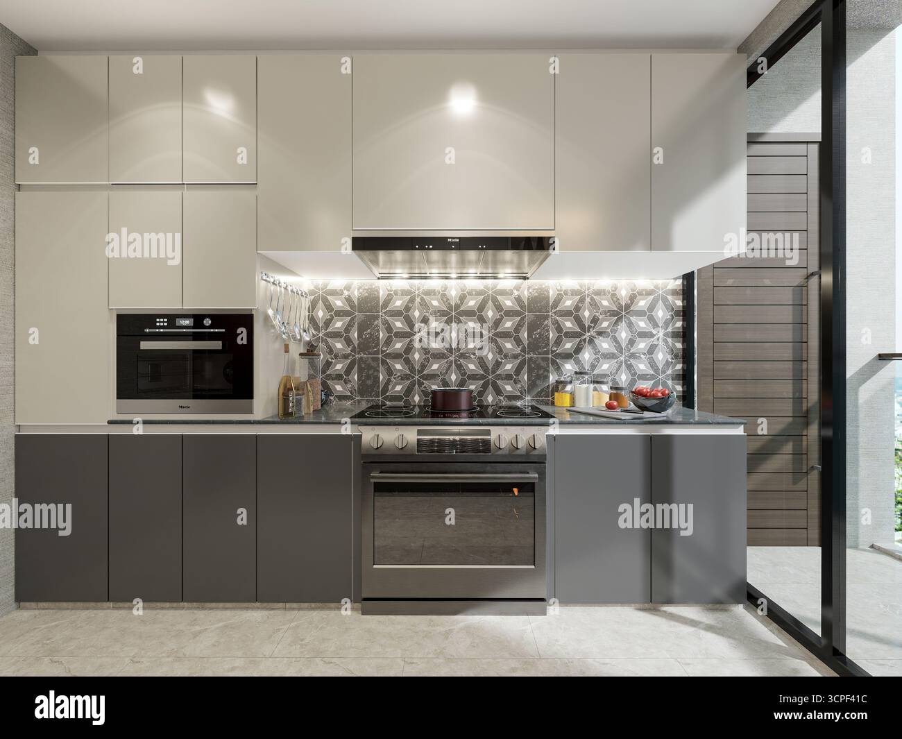 Intérieur de cuisine moderne élégant et compact avec armoires bicolores, dosseret à motifs et appareils en acier inoxydable Banque D'Images