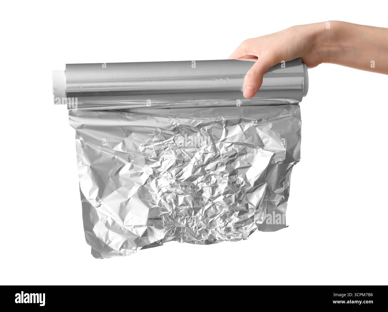 Main féminine avec rouleau de feuille d'aluminium sur fond blanc Banque D'Images
