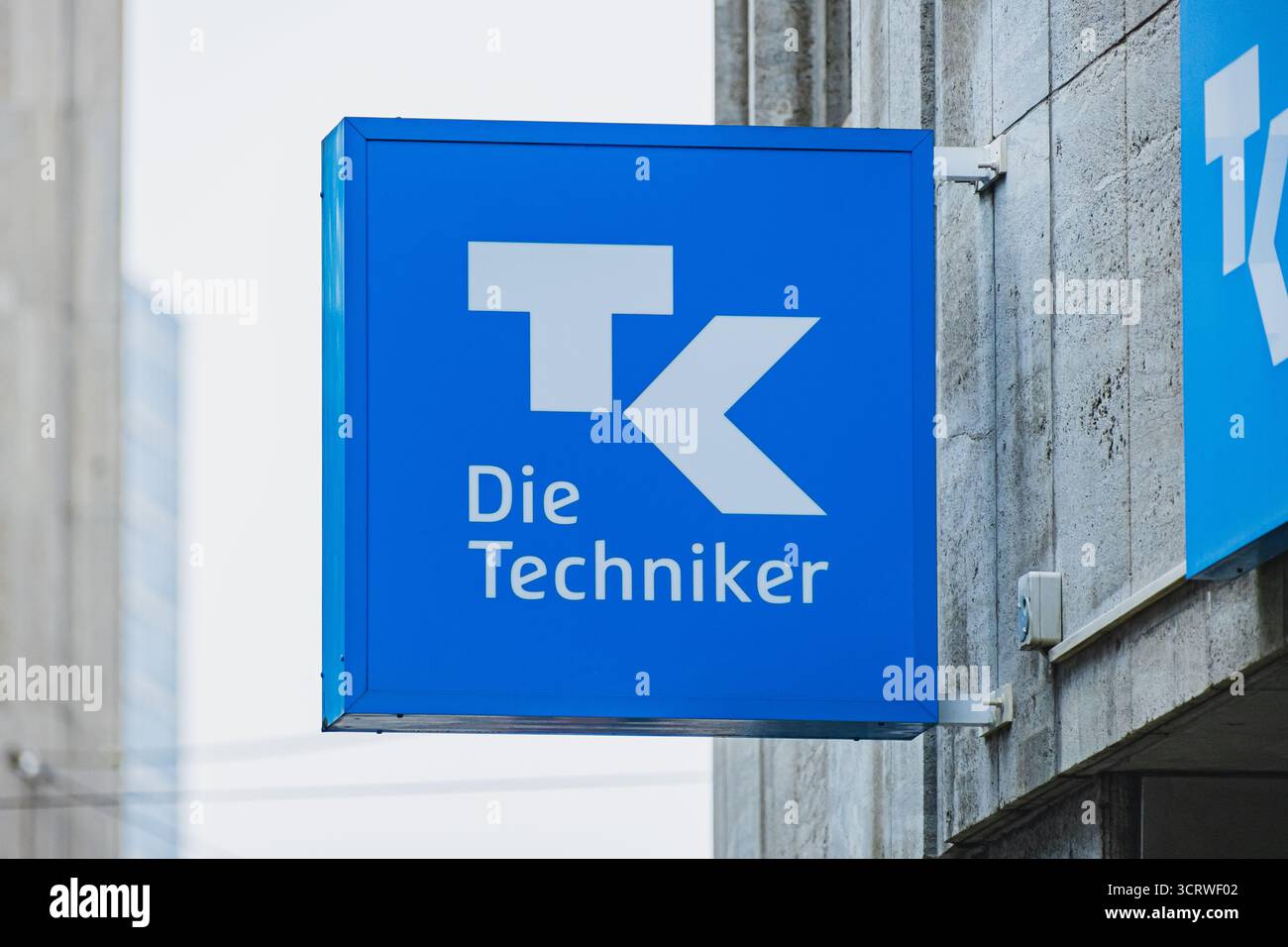 Techniker Krankenkasse, logo de la compagnie d'assurance allemande à l'extérieur d'une succursale située dans le centre de Dusseldorf Banque D'Images