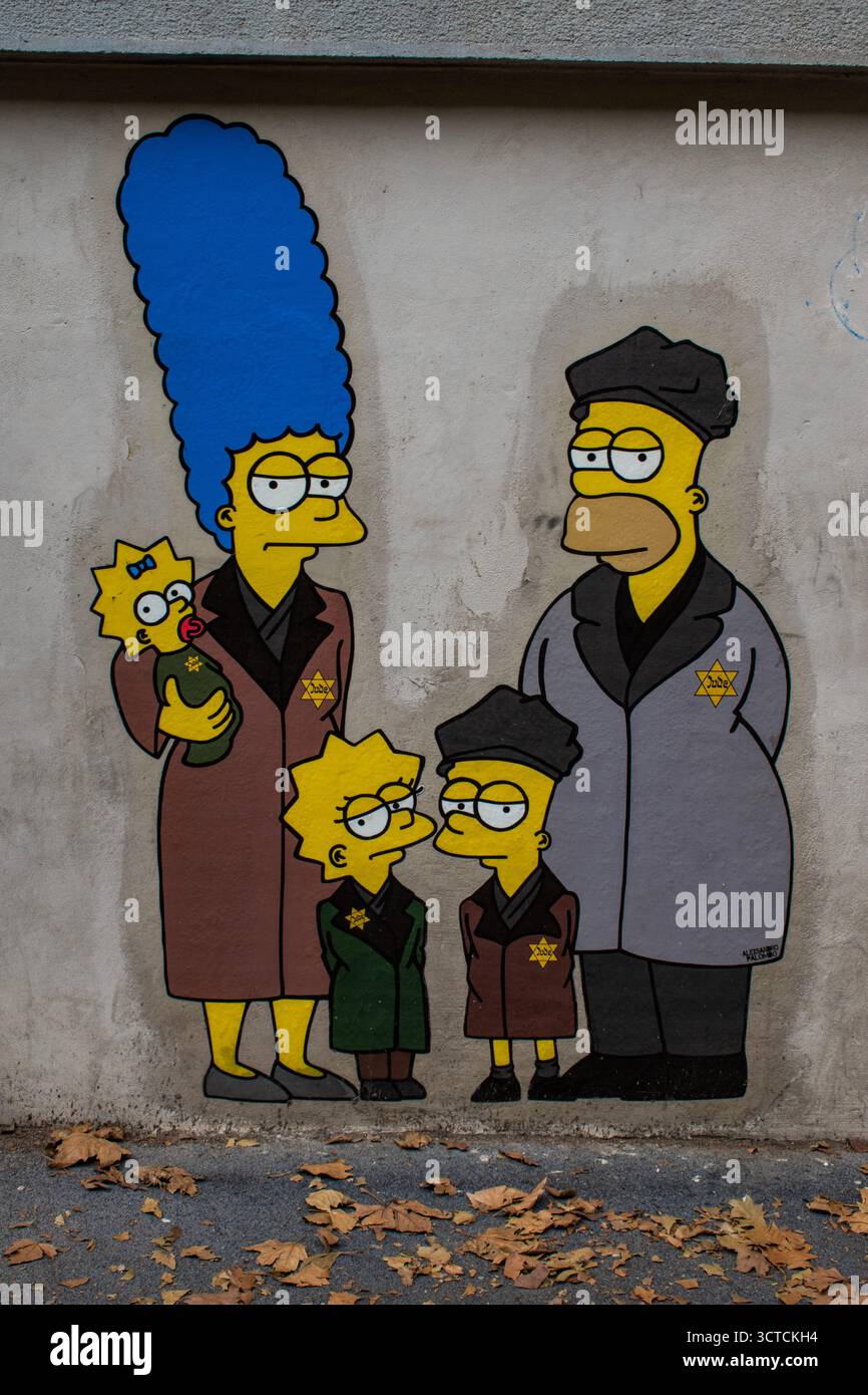 Milan, Italie : plateforme murale 21. Les Simpson déportés à Auschwitz par AleXsandro Palombo à l'entrée du mémorial de la Shoah le jour du souvenir de l'Holocauste 2023 Banque D'Images