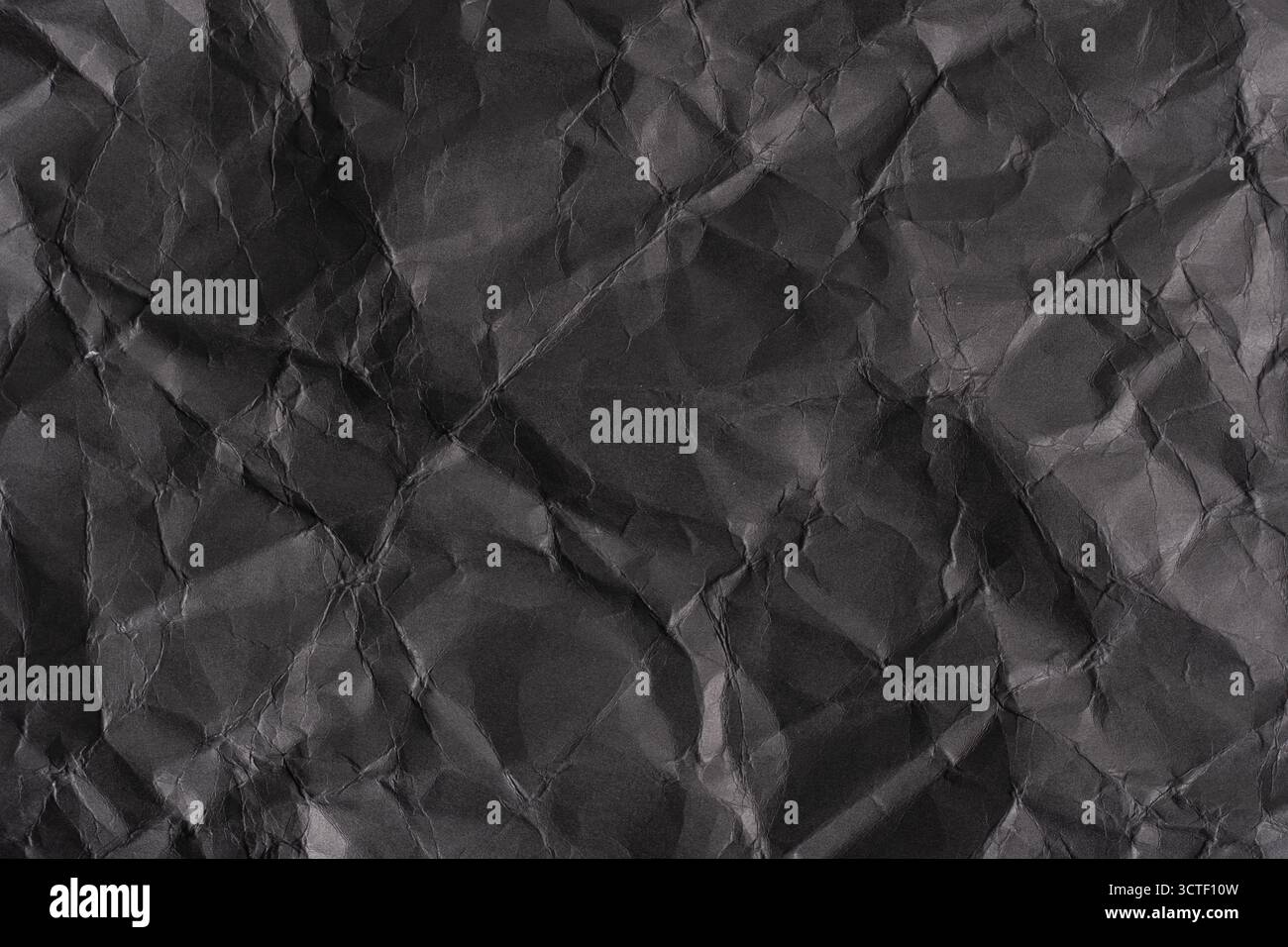 Fond de papier froissé noir. Texture du papier froissé Banque D'Images