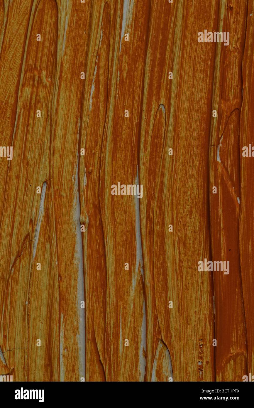 Traits de peinture orange brun abstrait créant un arrière-plan texturé avec des lignes verticales et des marques de pinceau Banque D'Images Traits de peinture orange brun abstrait créant un arrière-plan texturé avec des lignes verticales et des marques de pinceau Banque D'Images