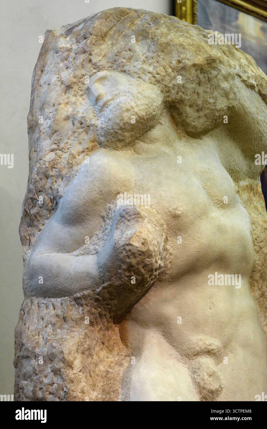Florence. Italie. L’esclave de l’éveil (vers 1525-1530), de Michelangelo Buonarroti, l’un des « prisonniers » ou « esclaves », une série de sculptures inachevées Banque D'Images