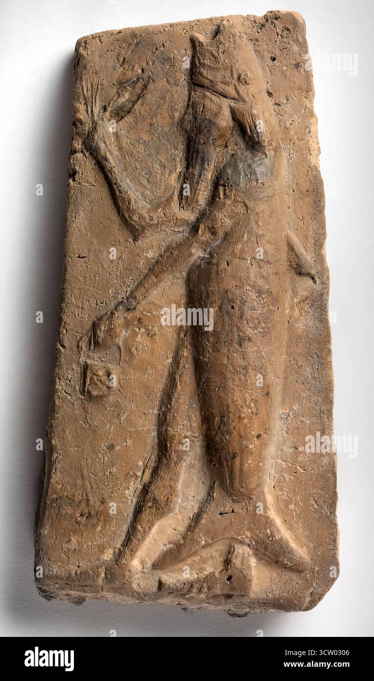 7845. Homme poisson, serviteur du Dieu Enki/EA, qui était à la fois humain, à la fois poisson. Ninive, CA. 650 av. J.-C. Banque D'Images