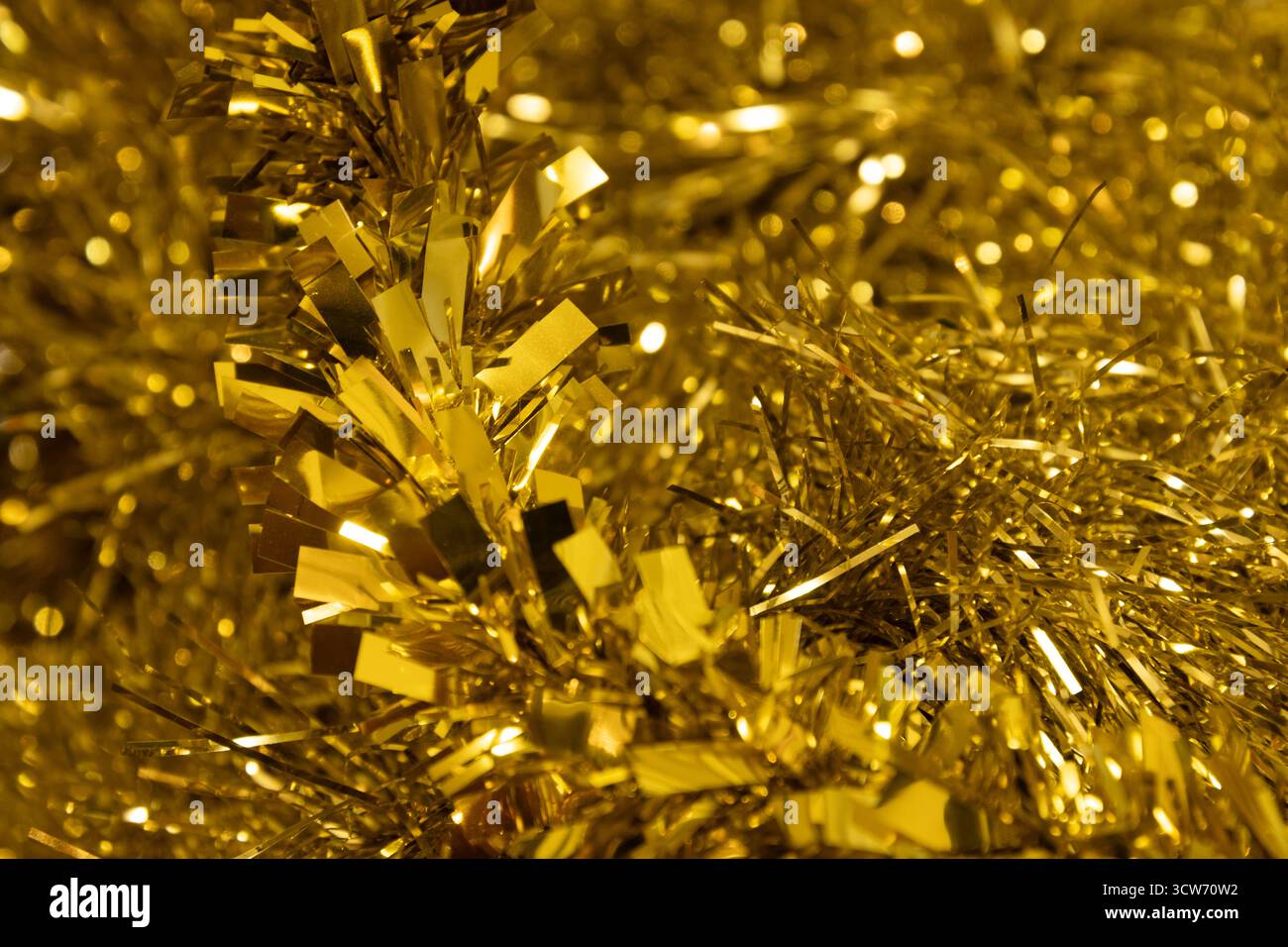 Fond bokeh d'arbre de Noël scintillant doré. Fêtes de Noël et du nouvel an, conception de vacances Banque D'Images