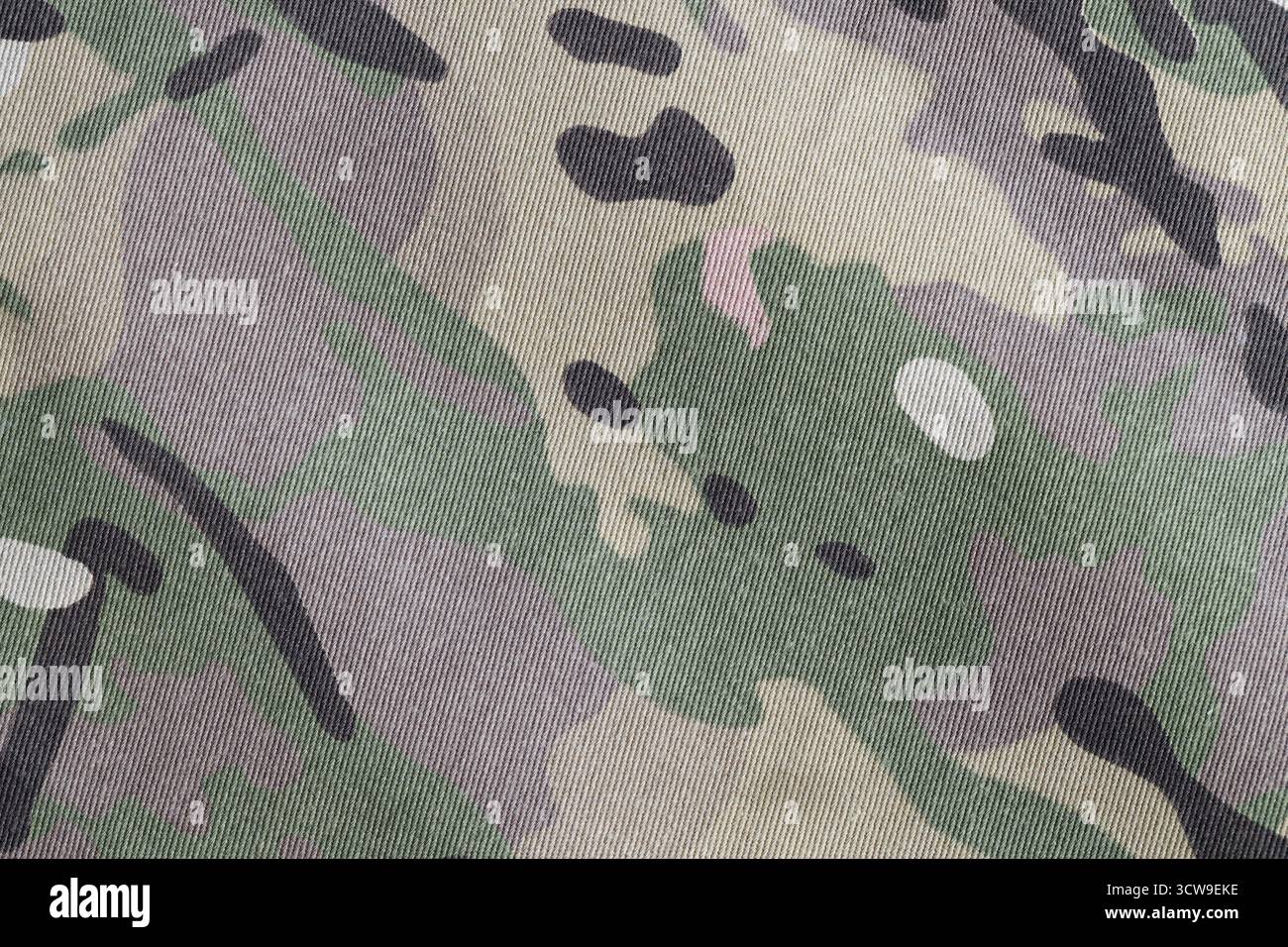 Fond de pièce de texture de tissu de camouflage de force armée multicam gros plan Banque D'Images