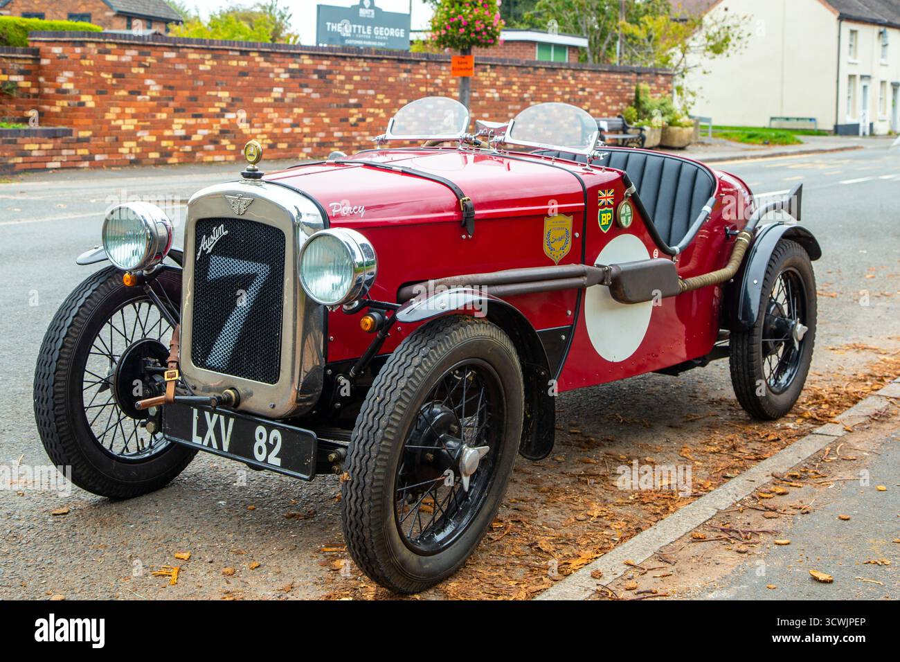 Rouge 1934 Austin 7 Ulster. Réplique Rod Yates carrosserie en aluminium reconstruite et enregistrée pour la première fois en 1952 Banque D'Images