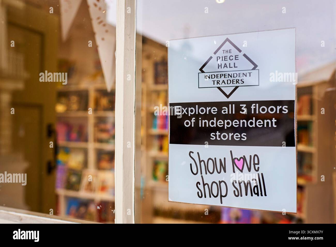 Vitrine de petite entreprise indépendante opérant dans le Hall de pièce, Halifax, Royaume-Uni Banque D'Images