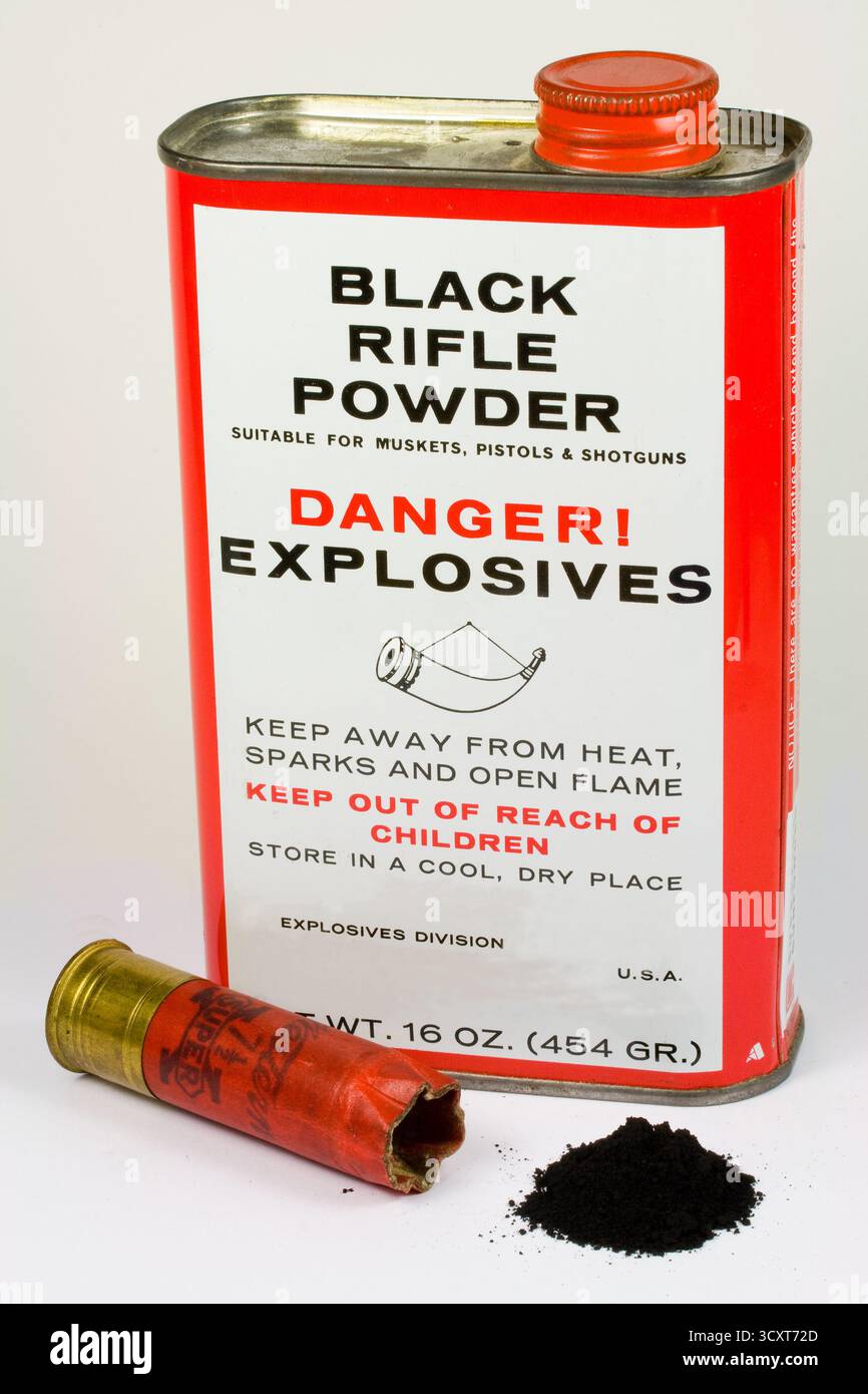 Vintage Black Powder Can et Old Paper 12 Gauge Shotgun Shell. Banque D'Images