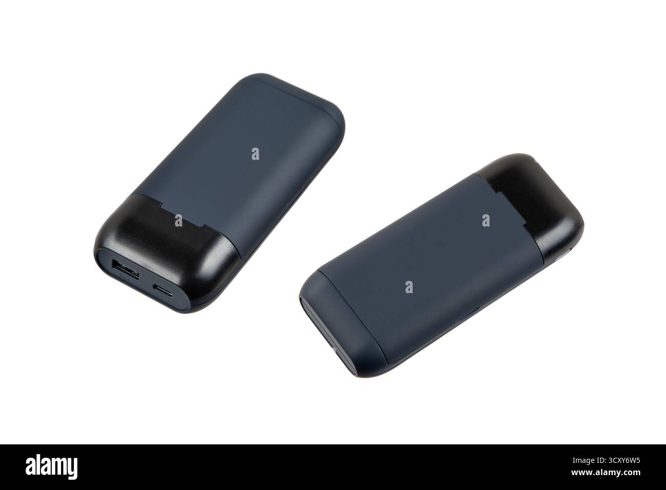 Appareil électronique portable noir et bleu foncé élégant avec ports USB, isolé sur un fond blanc incliné. Banque D'Images