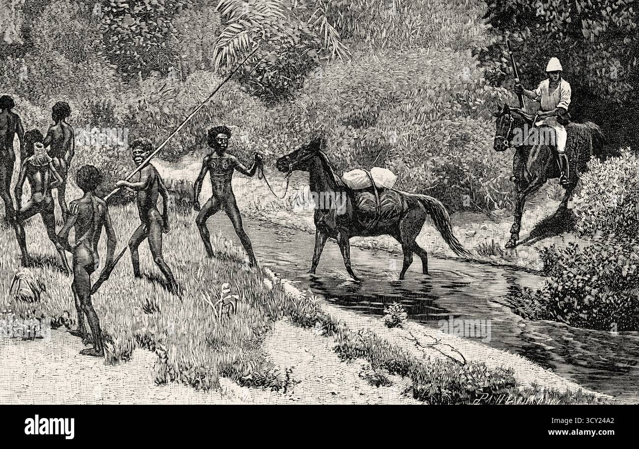 Traversée de la rivière Herbert. Australie, Océanie. Au pays des cannibales. Voyage d'exploration parmi les indigènes de l'Australie orientale, 1880-1884 par Carl Lumholtz (1851-1922) le Tour du monde de 1888 Banque D'Images