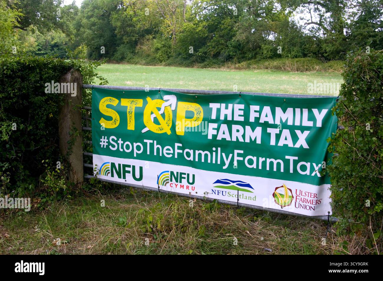 Arrêtez la bannière de l'impôt sur les familles agricoles Banque D'Images