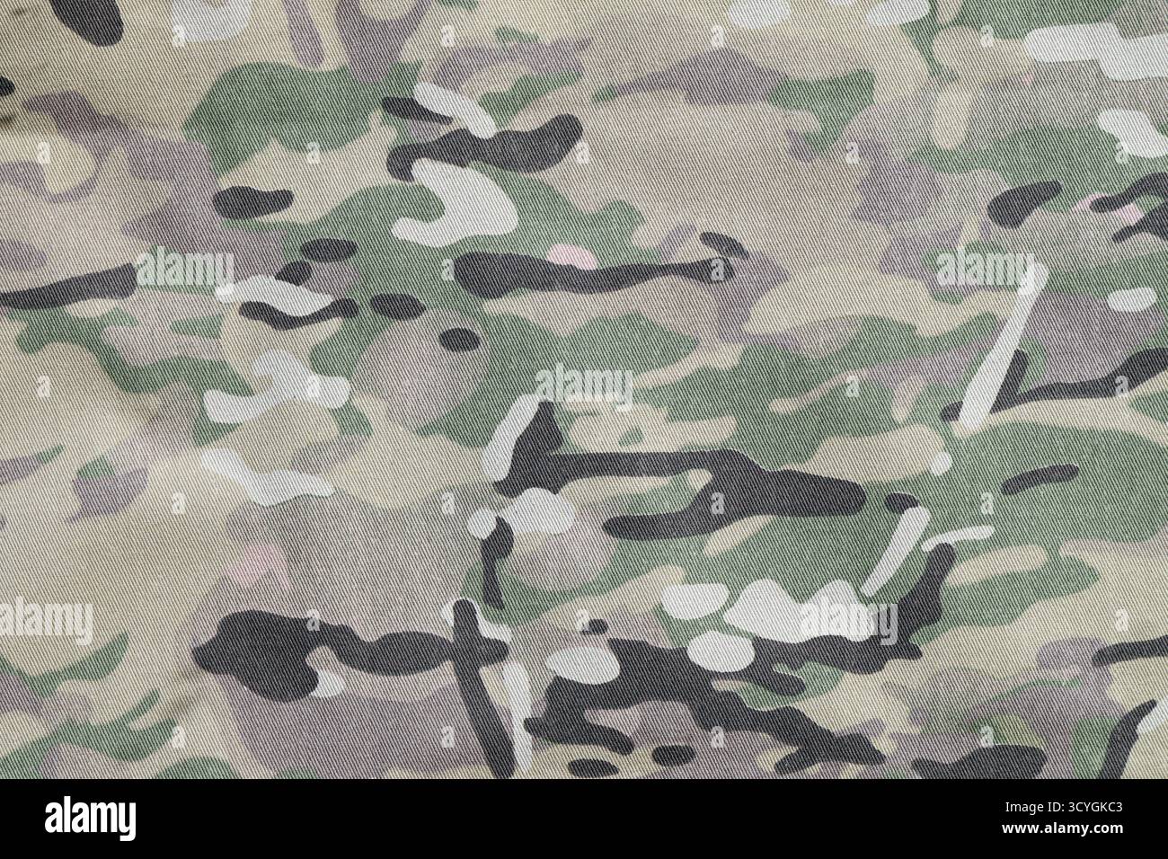 Fond de texture de tissu de camouflage de force armée multicam gros plan Banque D'Images