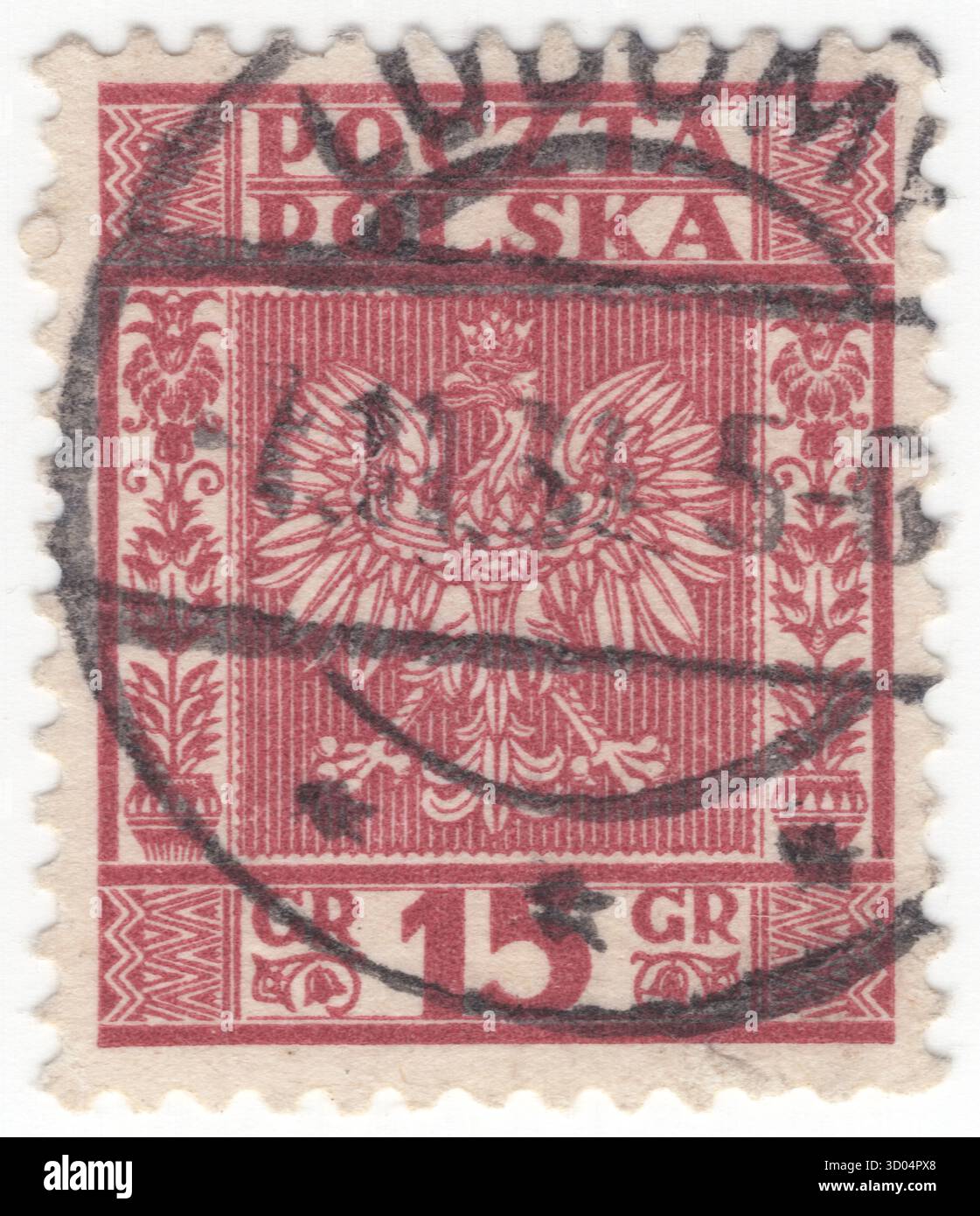 POLOGNE — 1933 septembre 23 : timbre-poste rouge-brun à 15 grosz représentant l'aigle polonais couronné, l'élément principal de l'armoiries, ornement floral et ethnique géométrique. Les armoiries de la Pologne sont un aigle blanc couronné avec un bec doré et des talons, sur un fond rouge. En Pologne, les armoiries dans leur ensemble sont appelées godło dans les documents officiels et les discours familiaux, malgré le fait que les autres armoiries sont généralement appelées une herbe. Cela provient du fait que dans l'héraldique polonaise, le mot godło signifie seulement une charge héraldique Banque D'Images