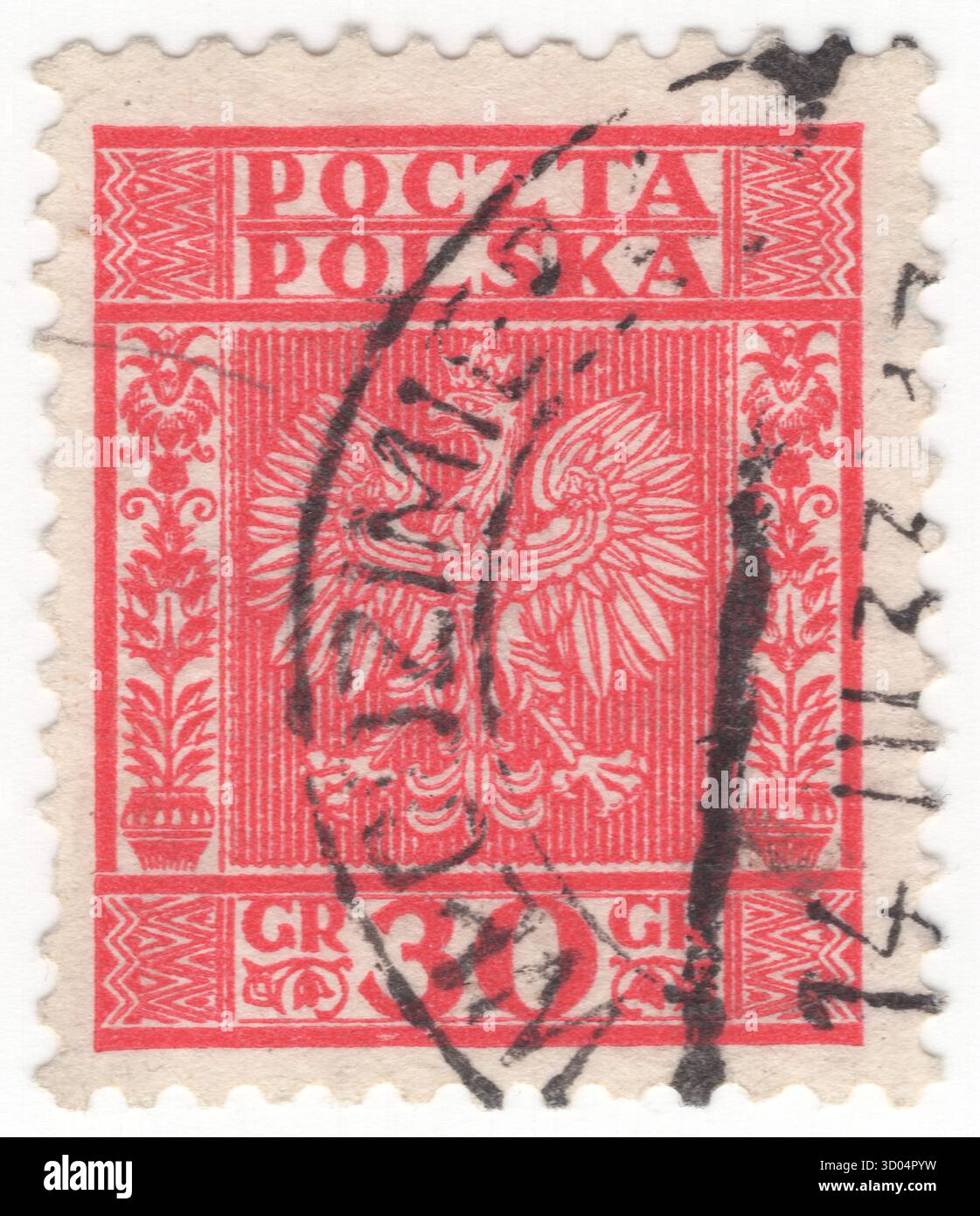 POLOGNE — 19 juillet 1932 : timbre-poste à rose profonde de 30 grosz représentant l'aigle polonais couronné, l'élément principal des armoiries, ornement floral et ethnique géométrique. Les armoiries de la Pologne sont un aigle blanc couronné avec un bec doré et des talons, sur un fond rouge. En Pologne, les armoiries dans leur ensemble sont appelées godło dans les documents officiels et les discours familiaux, malgré le fait que les autres armoiries sont généralement appelées une herbe. Cela provient du fait que dans l'héraldique polonaise, le mot godło signifie seulement une charge héraldique Banque D'Images