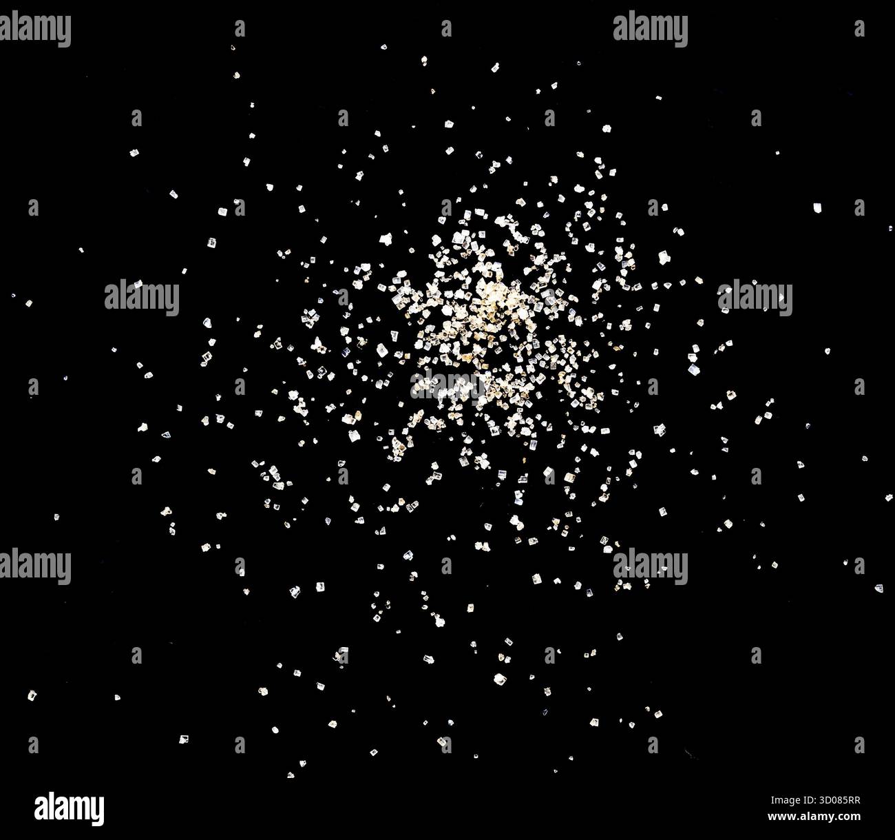 Sucre de canne brun sur fond noir Banque D'Images
