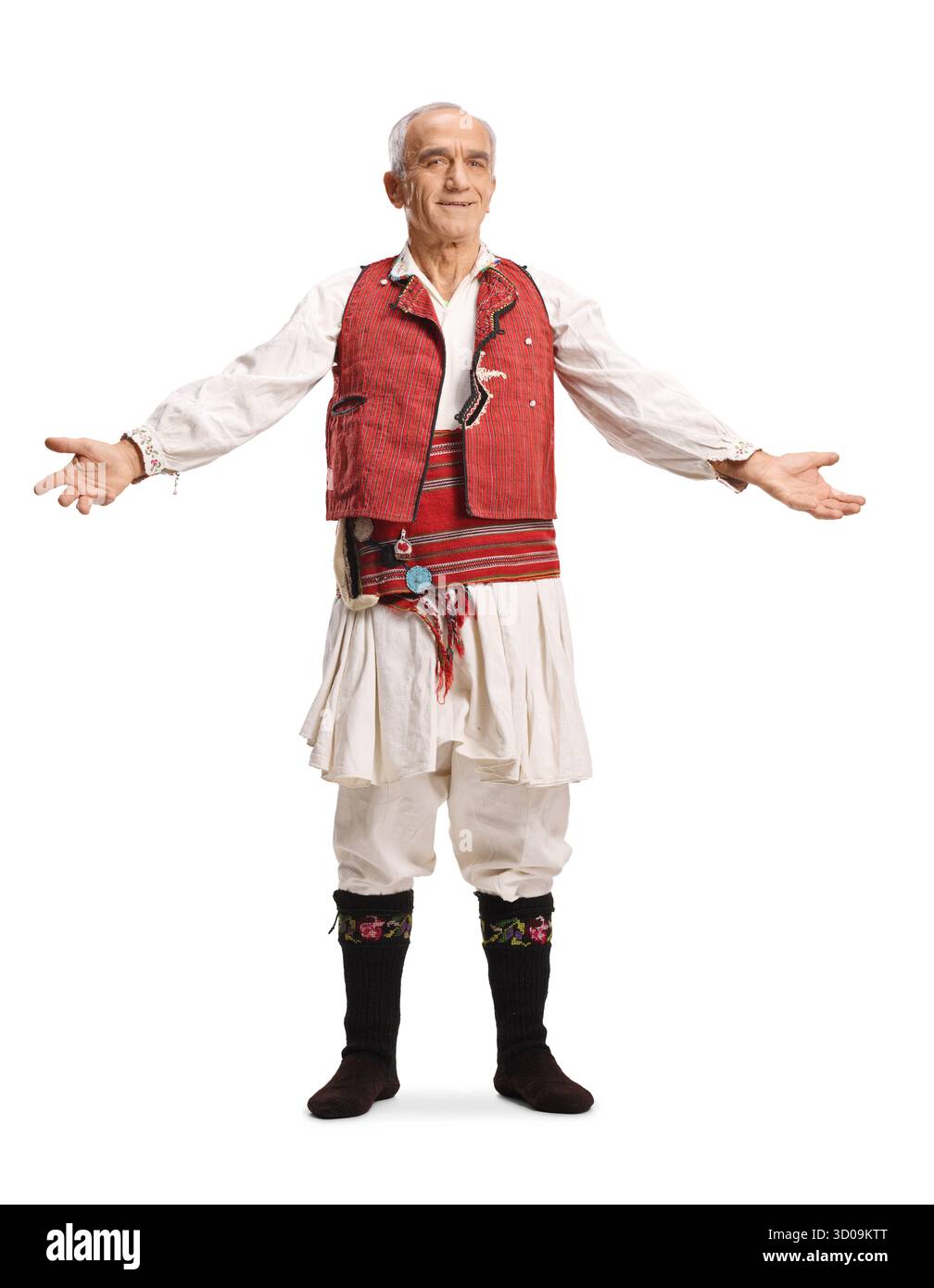 Portrait en longueur d'un homme âgé dans des vêtements folkloriques traditionnels isolé sur fond blanc Banque D'Images Portrait en longueur d'un homme âgé dans des vêtements folkloriques traditionnels isolé sur fond blanc Banque D'Images