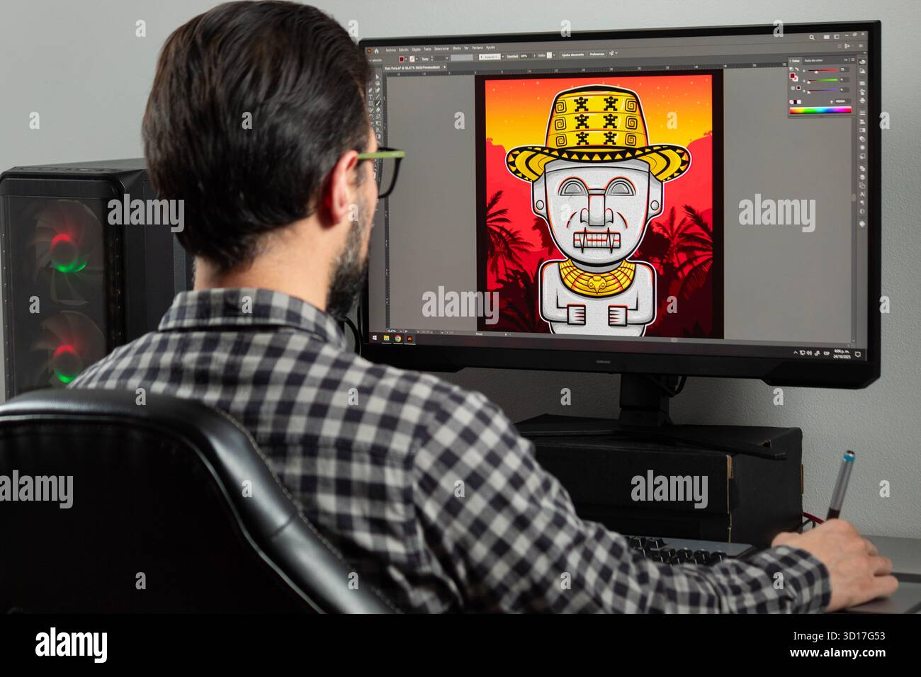Gros plan sur un graphiste homme en arrière concevoir une illustration dans adobe Illustrator logiciel dans un ordinateur de joueur Banque D'Images