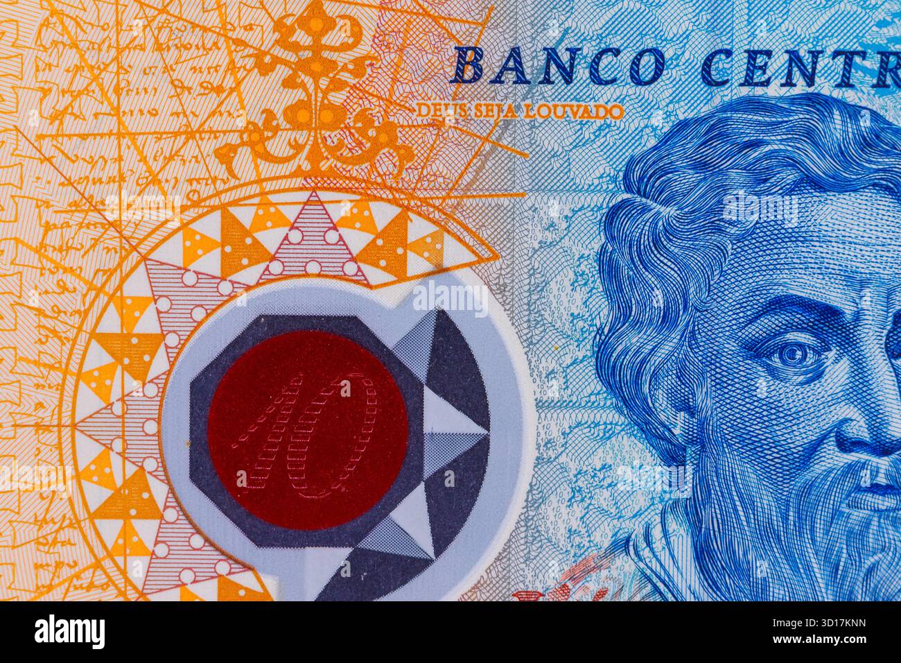 Un gros plan d'un billet de banque affiche des motifs complexes, du texte et un portrait, dominés par des teintes bleues et oranges. Banque D'Images