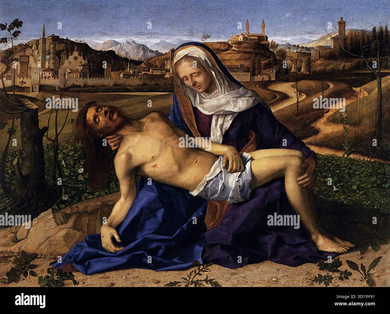 BELLINI, Giovanni (né vers 1426, Venezia, décédé en 1516, Venezia) Piet ? 1505 huile sur bois, 65 x 90 cm Gallerie dell'Accademia, Venise en arrière-plan, au-delà de l'emblématique figuier, s'élève une ville fortifiée dans laquelle les principaux bâtiments de Vicence peuvent être identifiés : le Duomo, la Torre, la basilique pré-palladienne, ainsi que le clocher de Sant'Appolinare Nuovo à Ravenne et le Natisone à Cividale. Mais nous n’arrivons à l’arrière-plan que plus tard, après avoir été attirés par la force dramatique intense du groupe au premier plan. La Vierge tient le Christ mort sur ses genoux, presque submergé et en être Banque D'Images