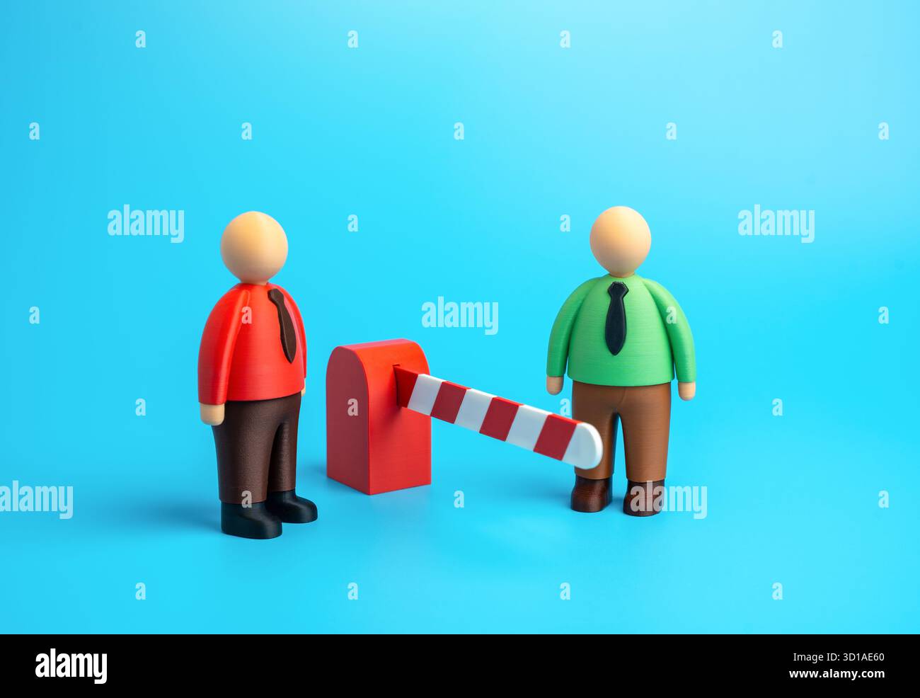 Deux employés se tiennent sur les côtés opposés d'une barrière. Gardez vos distances. Manque de confiance et obstacles à la communication en milieu de travail. Résolution des conflits Banque D'Images