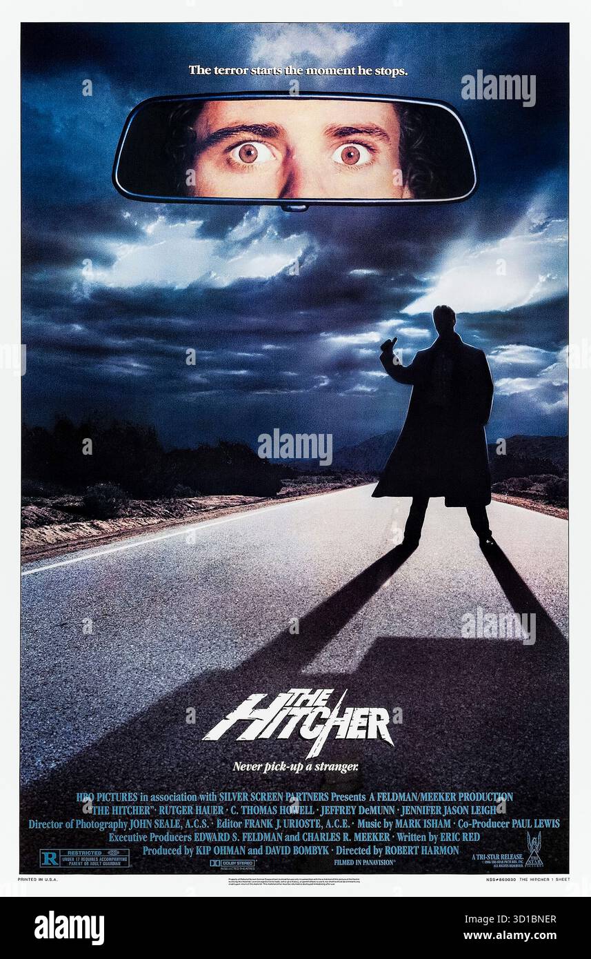 The Hitcher (1986) réalisé par Robert Harmon et mettant en vedette Rutger Hauer, C. Thomas Howell et Jennifer Jason Leigh. Un jeune homme voyageant à travers le désert est terrorisé par un auto-stoppeur meurtrier qui le piège pour ses crimes macabres. Photographie d'une affiche américaine originale de 1986 À USAGE ÉDITORIAL EXCLUSIF. Crédit : BFA / TriStar Pictures Banque D'Images
