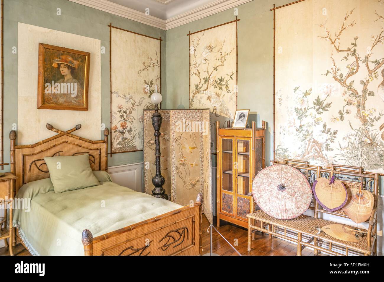 La chambre de Gabrielle Sand, la petite-fille de George Sand, est décorée dans un style oriental-japonais avec des murs vert clair, un bambou et rotin b Banque D'Images