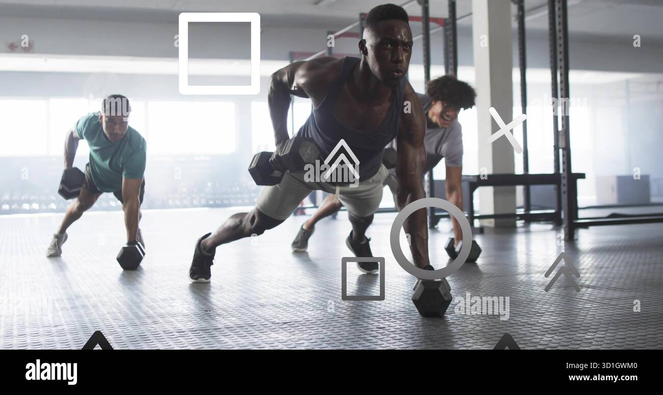 Homme afro-américain en rangée de planches saisissant des haltères près des fenêtres de la salle de sport, avec des graphiques superposés Banque D'Images