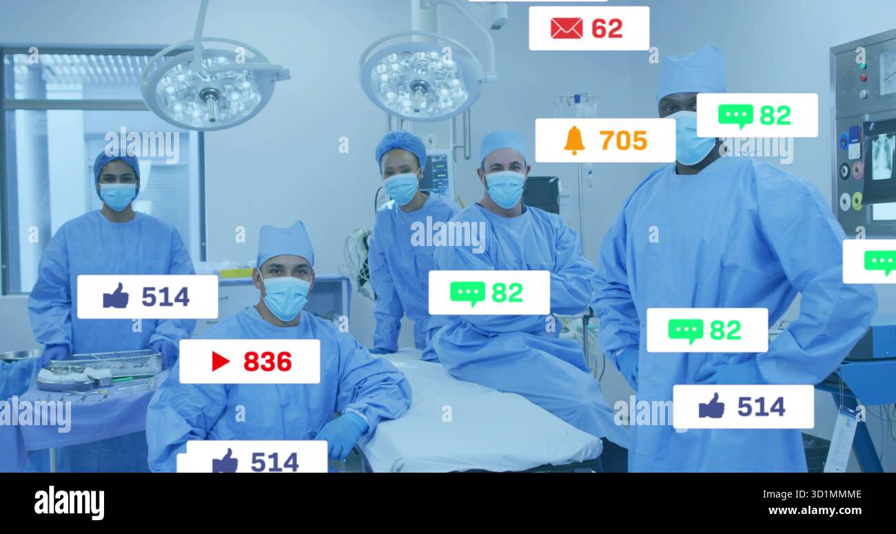 Positionnement de l'équipe chirurgicale préparant l'opération en salle d'opération, avec plafonniers chirurgicaux Banque D'Images
