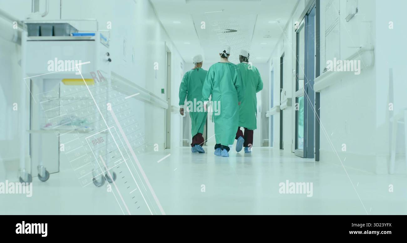 Marchant le long du couloir de l'hôpital, l'équipe médicale portant des blouses chirurgicales passant devant le chariot de fournitures Banque D'Images