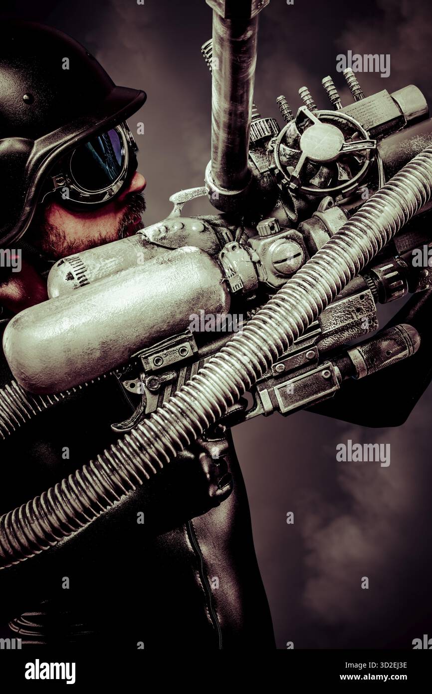 Guerrier de l'avenir avec un énorme canon laser fusil sur le chaos Banque D'Images