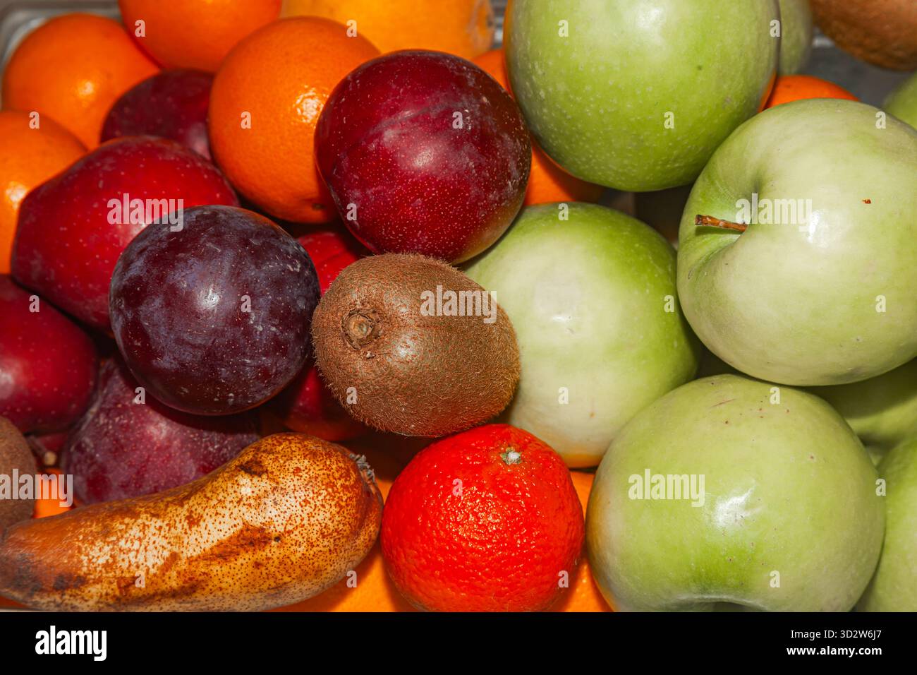 Fond de fruits de pommes, prunes, poires et oranges Banque D'Images