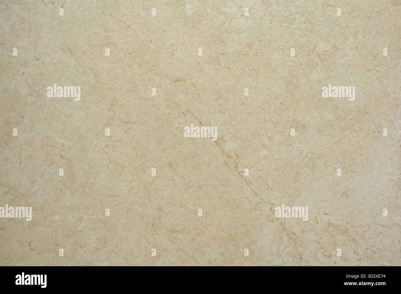 Texture de pierre naturelle de couleur jaune. Matériau de finition intérieure, carreaux muraux de salle de bain beige Banque D'Images