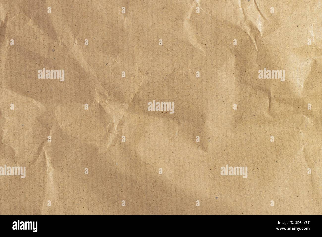 Vue de dessus et plein cadre de la texture de papier froissé ou froissé doublé ou brun utilisé comme texture de fond de papier brun froissé dans le travail d'art décoratif Banque D'Images