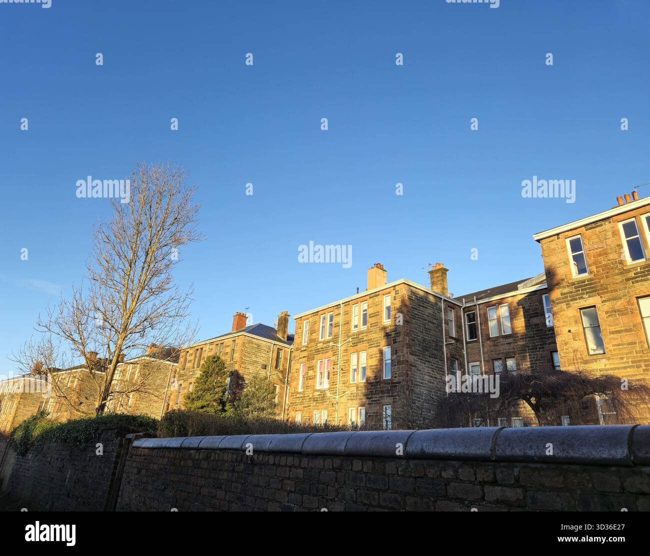 Une rangée de bâtiments de location, Glasgow, Écosse Banque D'Images