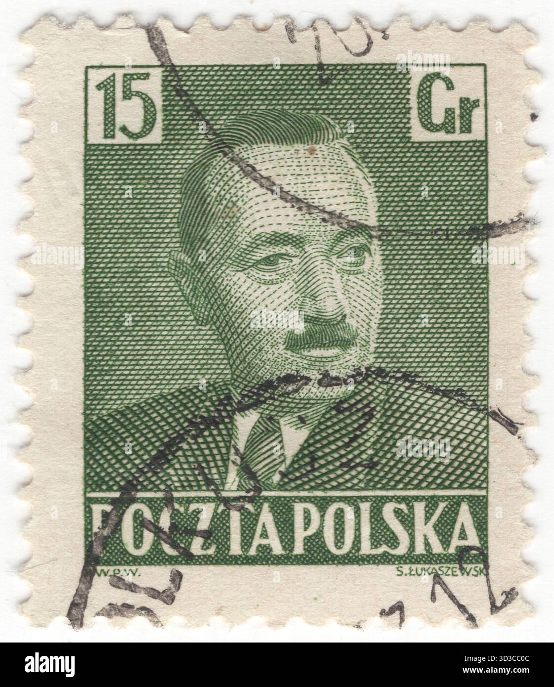POLOGNE — 1950 décembre 16 : 15 gros timbre-poste jaune-vert foncé portrait du président Boleslaw Bierut, militant communiste polonais et homme politique, dirigeant de la République populaire polonaise en 1947-1956. Il a été président du Conseil national d'État, président de la Pologne, secrétaire général du Comité central du Parti ouvrier Uni polonais et premier ministre. Il a mis en œuvre des aspects du système stalinien en Pologne. Avec Władysław Gomułka, son principal rival, Bierut est principalement responsable des changements historiques que la Pologne a subis au lendemain de la seconde Guerre mondiale Banque D'Images