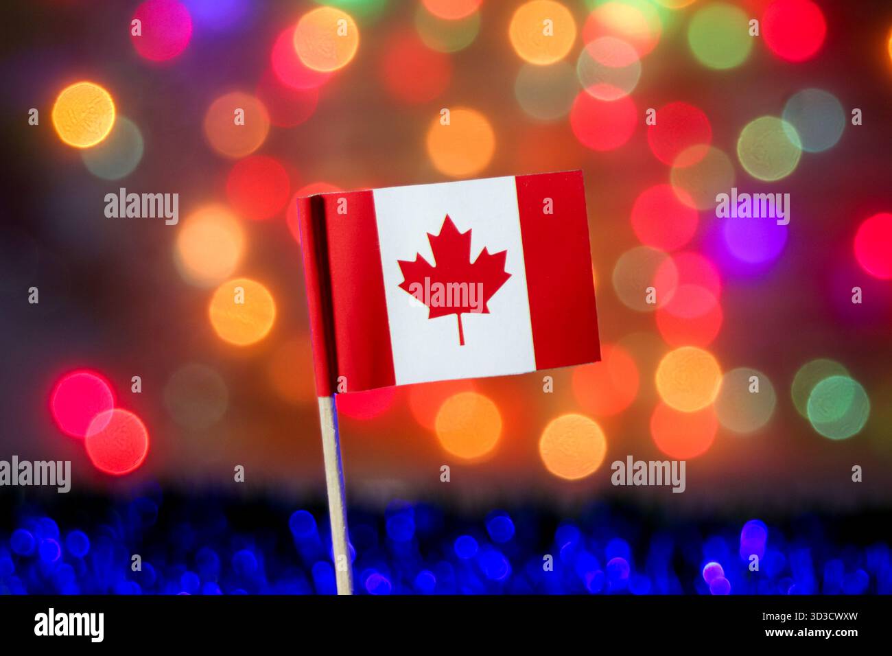 Drapeau canadien sur fond bokeh lumineux et coloré. Souligner la fierté nationale, l'économie du G7 et les célébrations majeures. Banque D'Images