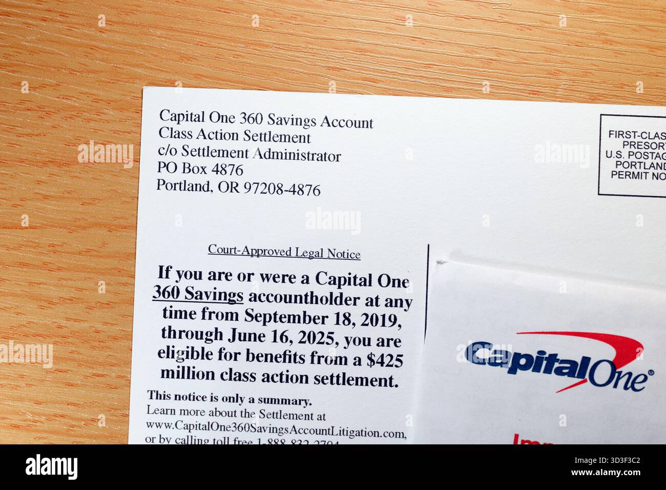 Une carte postale de notification de règlement d'une action collective Capital One 360 Banque D'Images