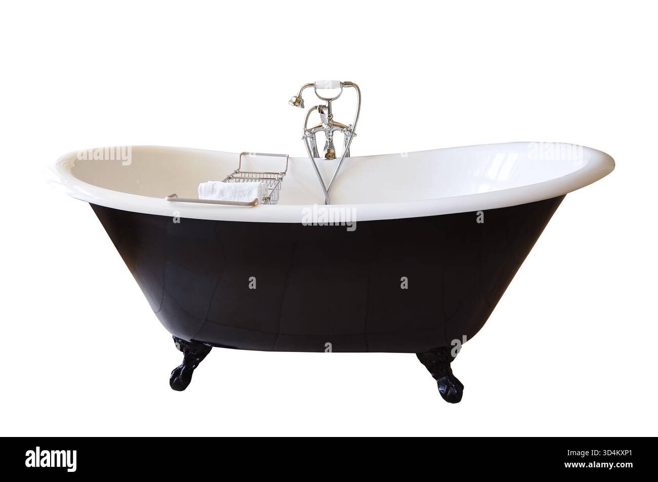 Baignoire vintage à pieds griffes noire et blanche isolée sur fond blanc, découpée Banque D'Images