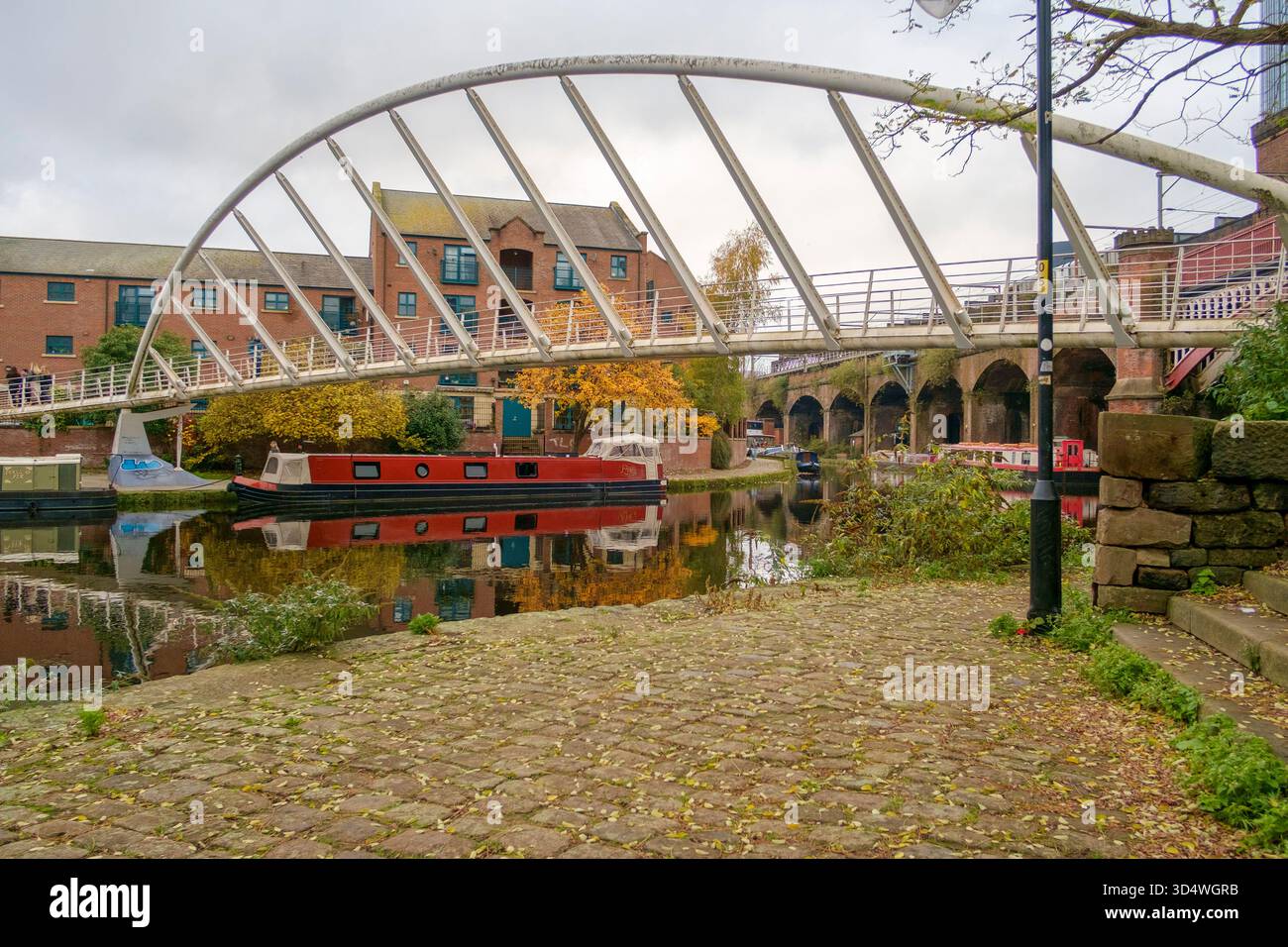 Pont de marchands traversant le canal Bridgewater à Castlefield dans le centre-ville de Manchester. Banque D'Images