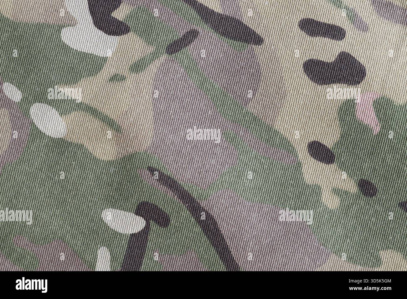 Fond de pièce de texture de tissu de camouflage de force armée multicam gros plan Banque D'Images