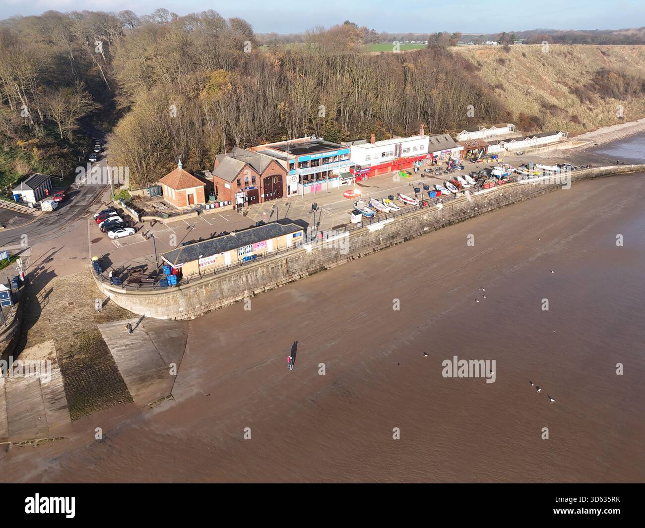 Vue panoramique sur Coble débarquant au bord de la mer britannique, le front de mer de Filey, Filey Bay. Yorkshire du Nord Banque D'Images