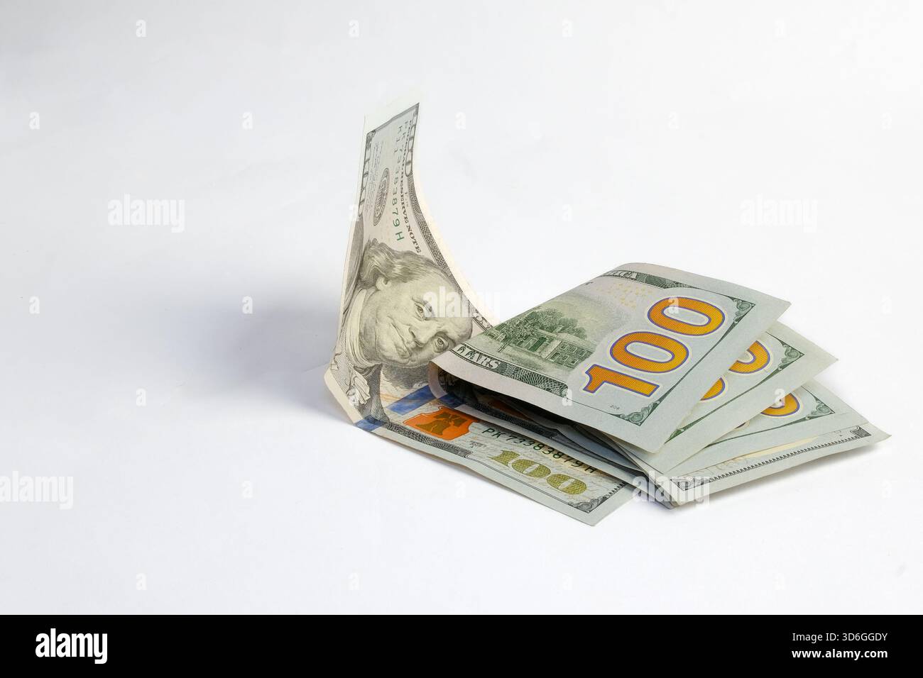 Une pile de billets de cent dollars Banque de photographies et d’images ...