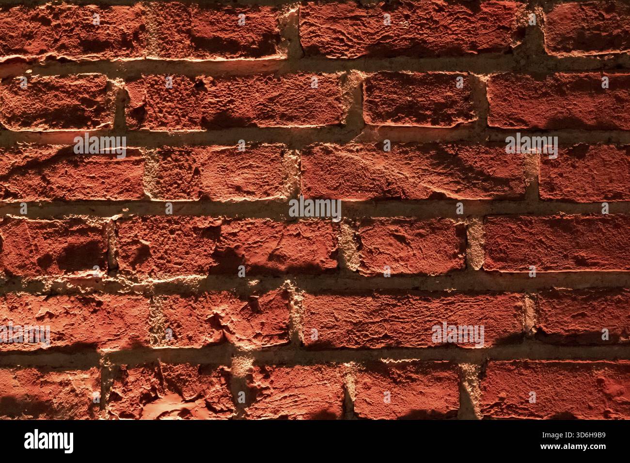 Arrière-plan de texture de mur de briques. Motif de vieux mur de briques abîmé. Pierres empilées mur surface rugueuse. Surface de grunge orange obsolète. Vintage Banque D'Images