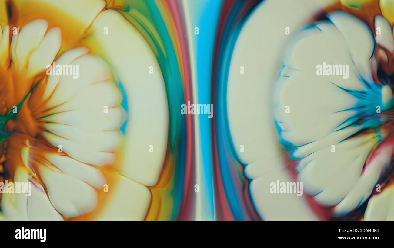 Art fluide lumineux présentant des motifs colorés vibrants symétriques Banque D'Images