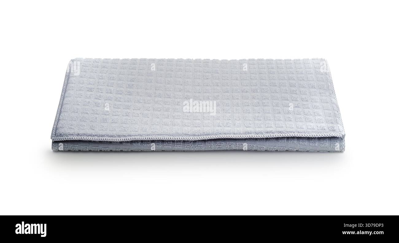 Tapis textile gris pour vaisselle isolé sur blanc. Banque D'Images