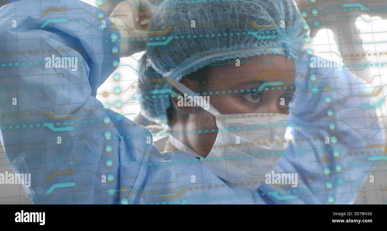 Réglage infirmière fixant les sangles du masque dans OU, avec bonnet, blouse chirurgicale, recouvrement numérique Banque D'Images