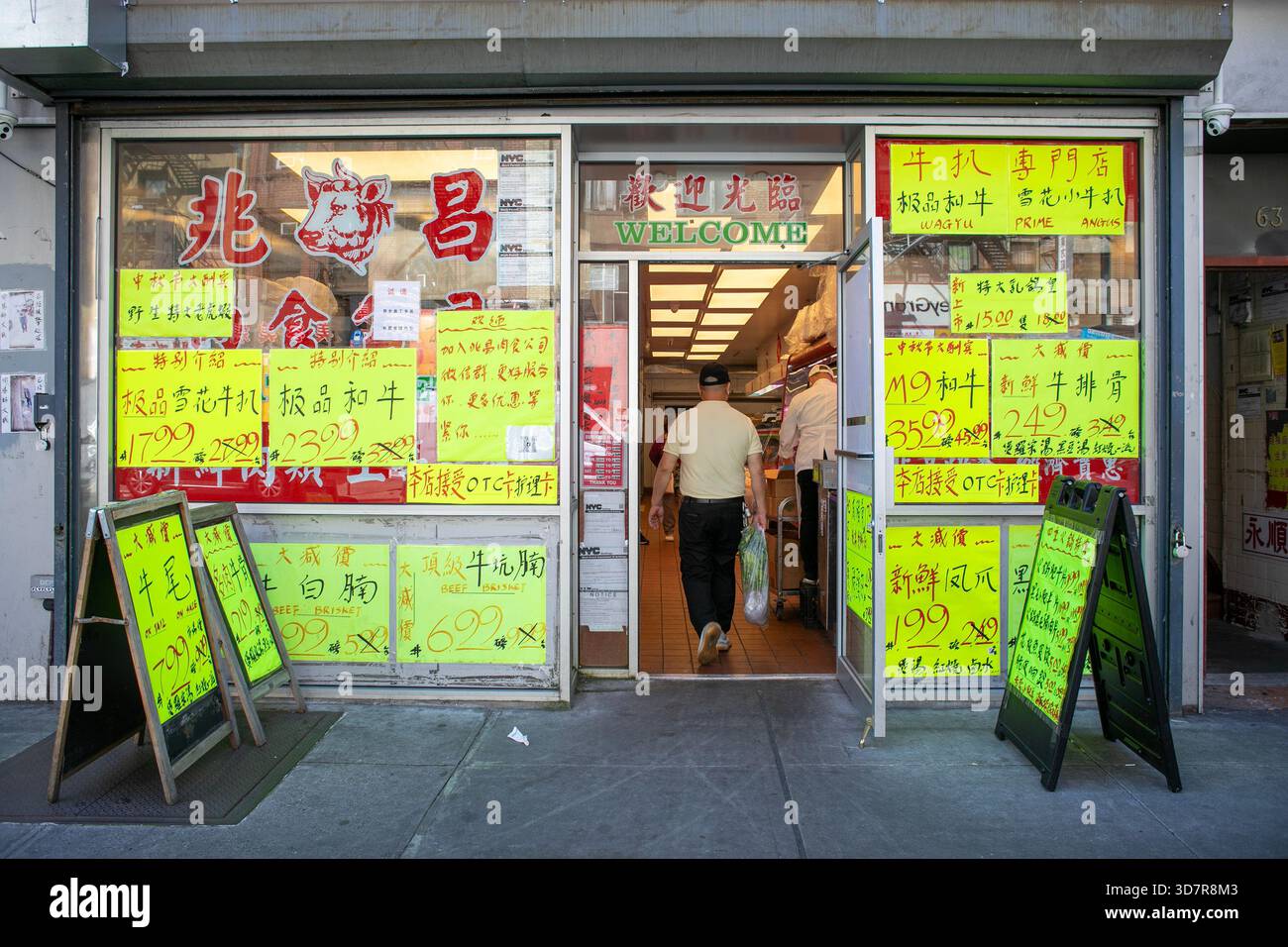 Entrée de magasin, Chinatown, New York. Banque D'Images