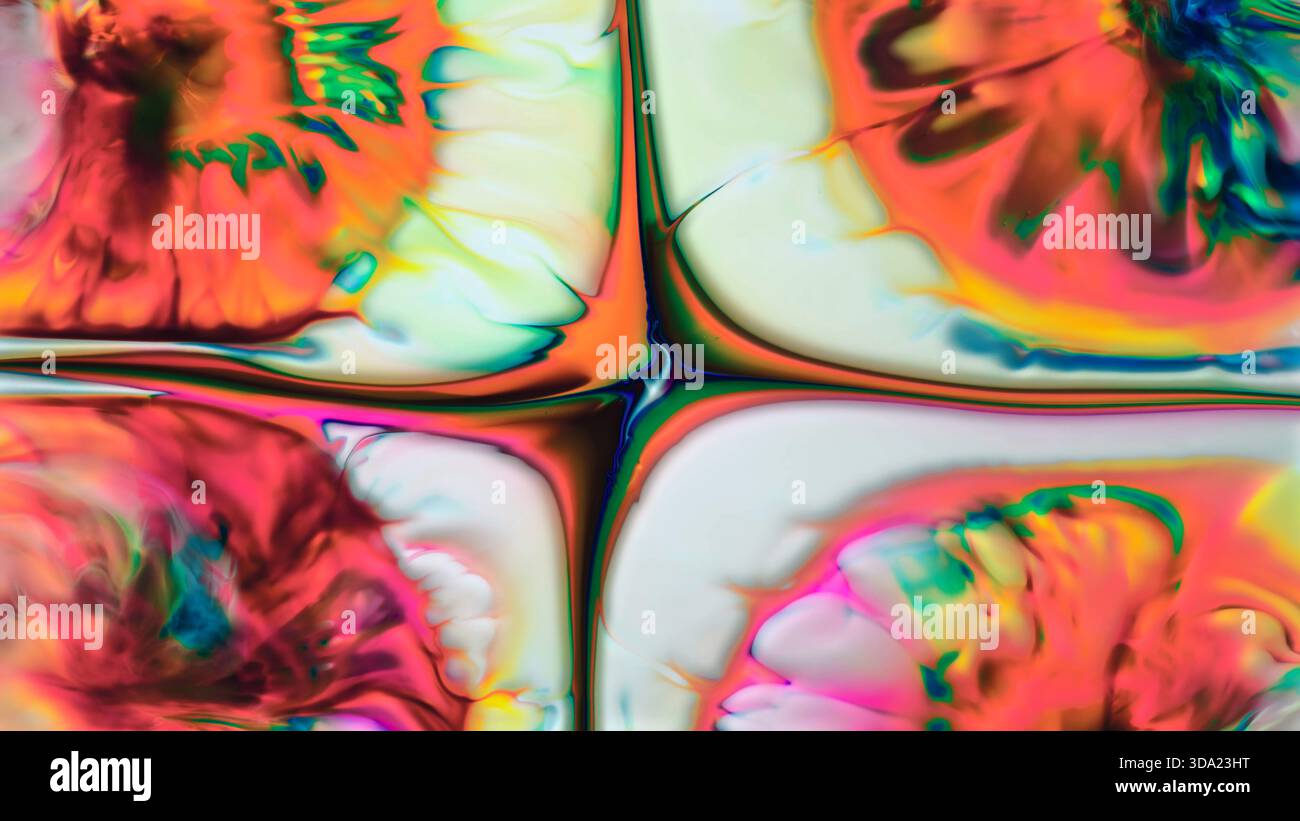 Des couleurs liquides vibrantes et tourbillonnantes créent un motif abstrait et psychédélique Banque D'Images